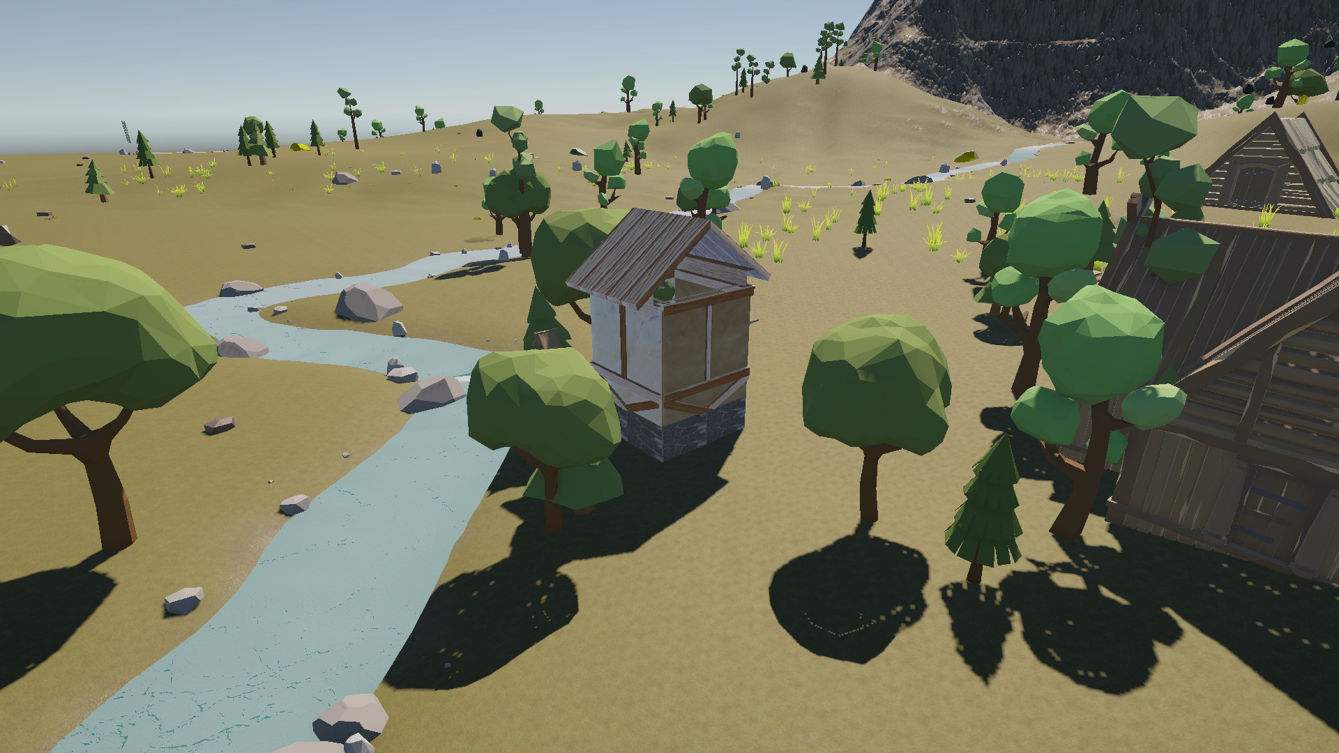 An early build: a hand-placed river across flat ground, a single low-poly building, and a treeline backing onto one modelled mountain — no erosion, biome or generation data behind any of it